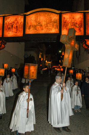 Mendrisio, Switzerland - 18 april 2003: people carrying lanterns during the annual procession to...