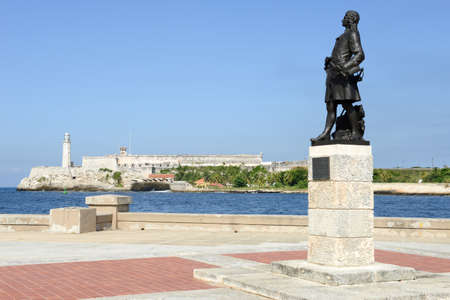 Romantic park in Havana with a view of the castle and lighthouse of El Morro at the bay entranceのeditorial素材