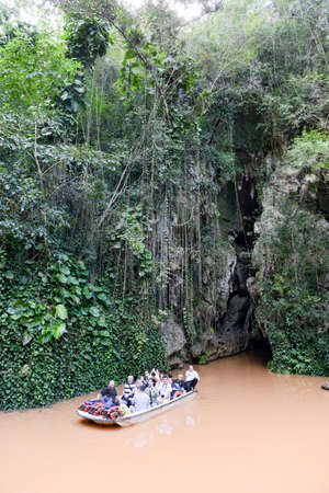 Vinales, Cuba - 24 january 2016: tourists sitting on a boat that has just crossed the  cave of Indio...