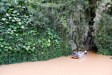 Vinales, Cuba - 24 january 2016: tourists sitting on a boat that has just crossed the  cave of Indio at the Vinales valley in Cubaのeditorial素材