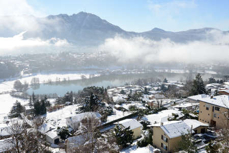 Lake Muzzano near Lugano on winter with snow on the italian part of Switzerlandの写真素材