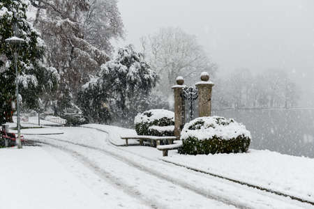 Lugano, Switzerland - 5 march 2016: It's snowing on the botanical park of Ciani in the center of Lugano on Switzerlandのeditorial素材