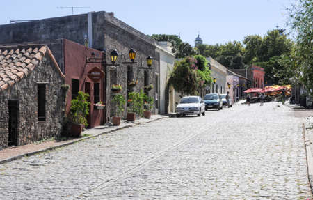 Colonia del Sacramento, Uruguay - 13 february 2011: people walking on the street in colonial town of Colonia del Sacramento in Uruguayのeditorial素材