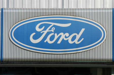 Lugano,12 november 2002 - Logo sign of Ford car dealer at Lugano on Switzerlandのeditorial素材