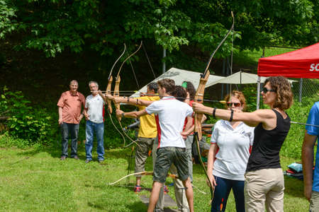 Massagno, Switzerland - 12 June 2016 - people who are learning to archery at Massagno on the italian part of Switzerlandのeditorial素材