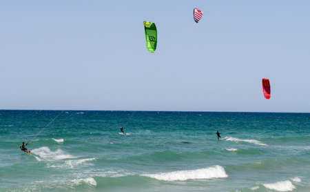 Torre Canne, Italy - 22 June 2016: People practicing kitesurf on the beach of Torre Canne on Puglia, Italyのeditorial素材
