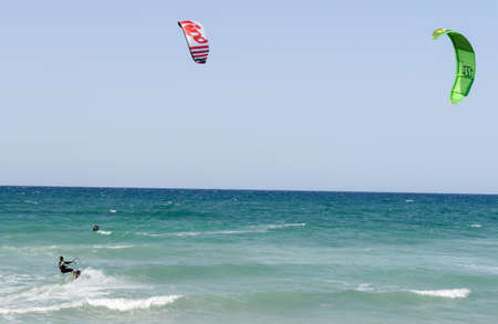 Torre Canne, Italy - 22 June 2016: People practicing kitesurf on the beach of Torre Canne on Puglia, Italyのeditorial素材