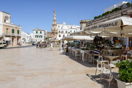 Ostuni, Italy - 21 June 2016: people walking on the central square of Ostuni the white town of Puglia on south Italyのeditorial素材
