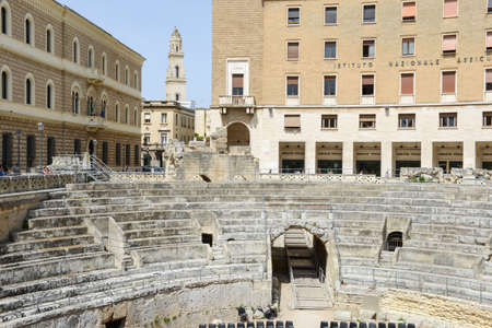 The iconic roman amphitheatre in Sant'Oronzo square, one of the most visited spots in Lecce on Puglia, Italyのeditorial素材