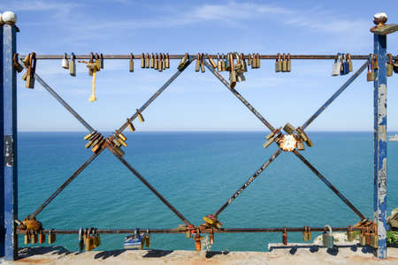 Locks on the fence of the bridge. Lovers lock their love with the lock.のeditorial素材