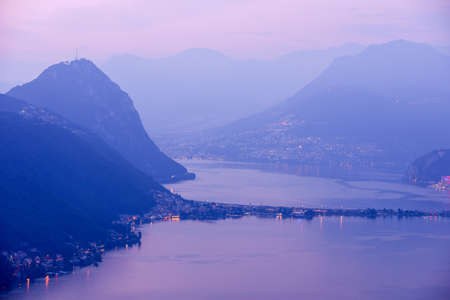Lugano, Switzerland.  View at lake of Lugano at sunsetの写真素材