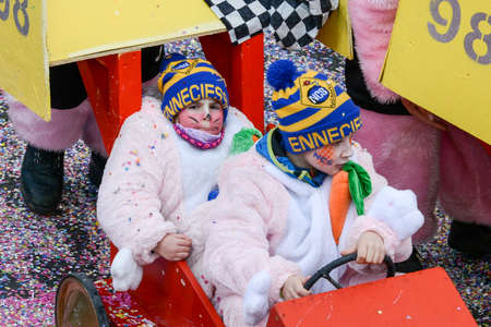 Tesserete, Switzerland - 13 February 2016: people marching in the parade of the carnival at Tesserete on the italian part of Switzerlandのeditorial素材