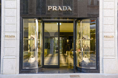 Lugano, Switzerland - 25 august 2016: showcases of Prada fashion clothes store at Lugano on...