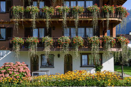 Wolfenschiessen, Switzerland - 24 September 2016: beautiful chalet adorned with flowers at Wolfenschiessen on the Swiss alpsのeditorial素材