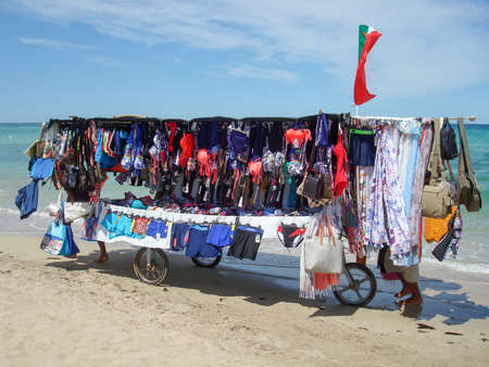 Torre Canne, Italy - 20 June 2016: hawkers push their cart on the beach of Torre Canne on Puglia, Italyのeditorial素材