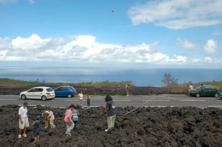 La Reunion island, France - 29 December 2002: people visiting the place of the last lava eruption on La Reunion island, Franceのeditorial素材