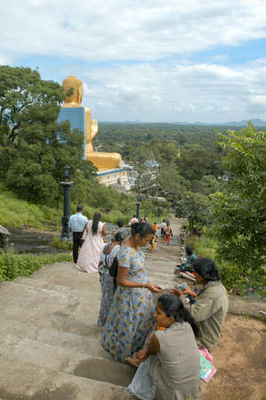 Dambulla, Sri Lanka - 18 December 2004: people speaking in front of Golden temple in Dambulla on Sri Lankaのeditorial素材