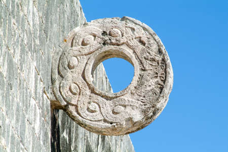 Famous Stone Ring located 9 m above the floor of the Great Ball Court. Chichen Itza archaeological site, Yucatan, Mexicoの写真素材