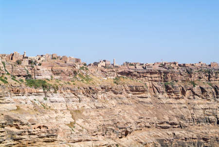 Red rocks and decorated old houses of Kawkaban fortified city, Republic of Yemenの写真素材