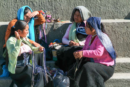Cristobal de las Casas, Mexico - 19 January 2009: maya woman sitting and arguing at the market of San Cristobal de las Casas on Chiapas, Mexicoのeditorial素材