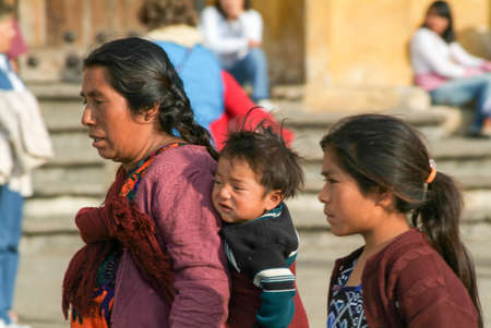 Cristobal de las Casas, Mexico - 19 January 2009: maya woman with her children at San Cristobal de las Casas on Chiapas, Mexicoのeditorial素材