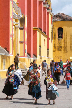 Cristobal de las Casas, Mexico - 19 January 2009: maya woman walking in front of the cathedral of San Cristobal de las Casas on Chiapas, Mexicoのeditorial素材