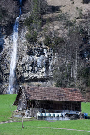 Grafenort, Switzerland - 5 March 2017: farmhouse in the countryside Grafenort on the Swiss alpsのeditorial素材