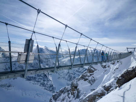 Engelberg, Switzerland - 2 March 2017: People walking on the Cliff Walk of mount Titlis on the Swiss alpsのeditorial素材