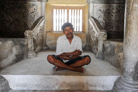 Yogyakarta, Indonesia - 29 January 2013: man sitting on Taman Sari water palace of Yogyakarta on Java island, Indonesiaのeditorial素材