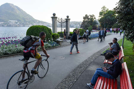 Lugano, Switzerland - 14 April 2017: people walking and taking pictures at the botanical garden of Lugano on Switzerlandのeditorial素材