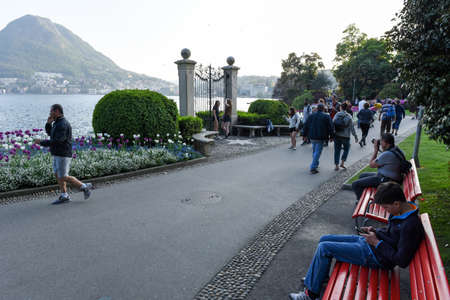 Lugano, Switzerland - 14 April 2017: people walking and taking pictures at the botanical garden of Lugano on Switzerlandのeditorial素材