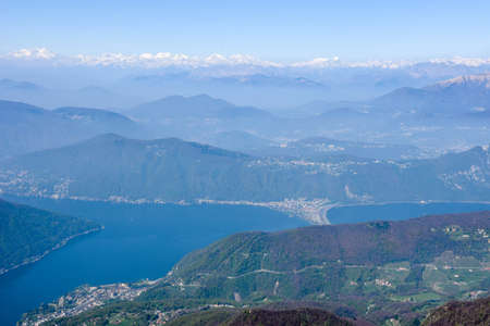 View from Monte Generoso down to Lugano and its lake in Switzerland