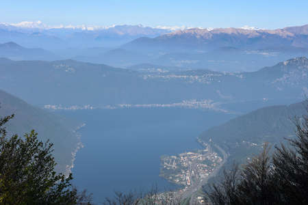 View from Monte Generoso down to Lugano and its lake in Switzerland