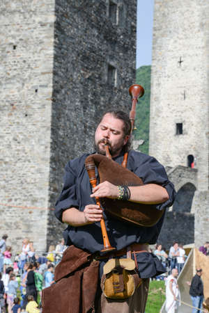 Bellinzona, Switzerland - 21 May 2017: Medieval bagpiper at Castelgrande castle in Bellinzona on the...