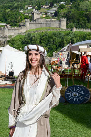 Bellinzona, Switzerland - 21 May 2017:  beautiful woman at the medieval market on Castelgrande...