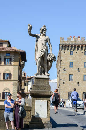 Firenze, Italy - 5 July 2017: people walking over the bridge of Ponte Vecchio in Florence on Italy.のeditorial素材
