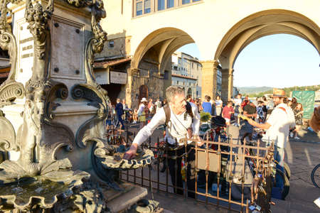 Firenze, Italy - 5 July 2017: people walking over the bridge of Ponte Vecchio in Florence on Italy.のeditorial素材
