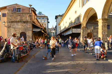 Firenze, Italy - 5 July 2017: people walking over the bridge of Ponte Vecchio in Florence on Italy.のeditorial素材
