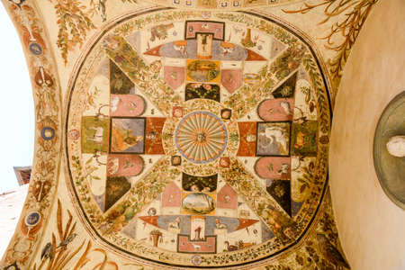 Frescos on arches of Chigi Saracini palace at Siena on Italy