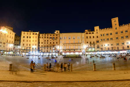 Siena, Italy - 6 July 2017: people walking on Il Campo square at Siena, Italyのeditorial素材