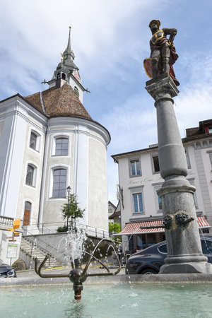 Schwyz, Switzerland - 11 July 2017: church and sculpture of Schwyz on Switzerlandのeditorial素材
