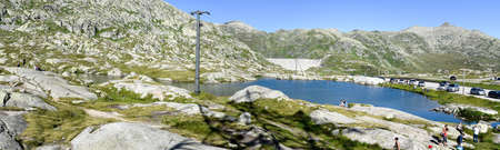 Gotthard pass, Switzerland - 5 August 2017: people visiting on walking the Gotthard pass on the Swiss alpsのeditorial素材