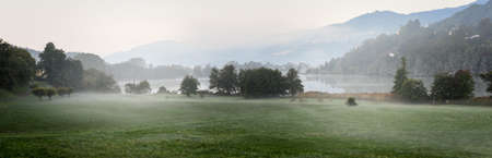 Landscape of lake Muzzano near Lugano on the italian part of Switzerlandの写真素材