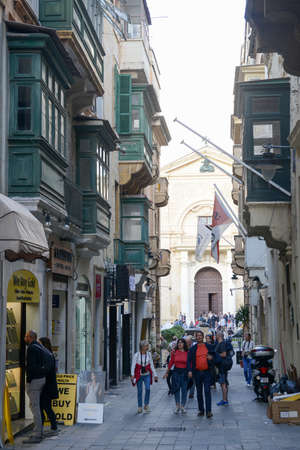 Valletta, Malta - 31 October 2017: people walking in the pedestrian area of Valletta on Malta.のeditorial素材