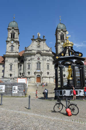 Einsedeln, Switzerland - 3 August 2017: people walking in front of Einsiedeln abbey on Switzerlandのeditorial素材