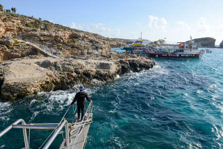Comino, Malta - 30 October 2017: tourist boat is landing at the island of Comino on Maltaのeditorial素材
