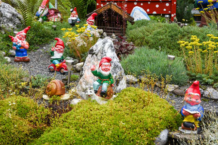 Garden gnomes in a garden of a house at Engelberg on the Swiss alpsの写真素材