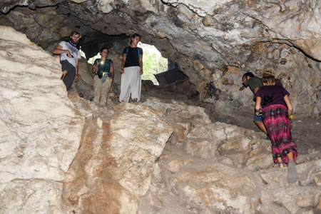 Battambang, Cambodia -15 January 2018: people walking in to the killing caves of Phnom Sampeau at Battambang on Cambodiaのeditorial素材
