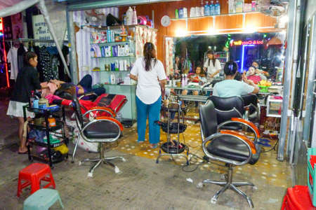 Phnom Penh, Cambodia - 16 January 2018: street hair salon at Phnom Penh on Cambodiaのeditorial素材