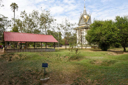 The memorial stupa of the Choeung Ek killing fields, containing some of the Khmer Rouge victims' remains. Near Phnom Penh, Cambodiaのeditorial素材